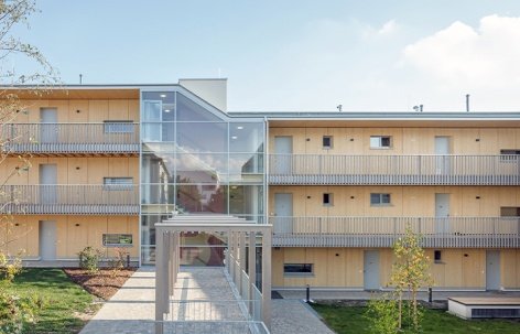 以木结构实现资源友好的社区住宅